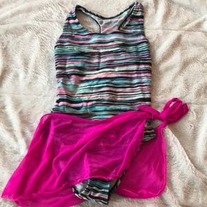 Striped swimsuit with pink side knot skirt